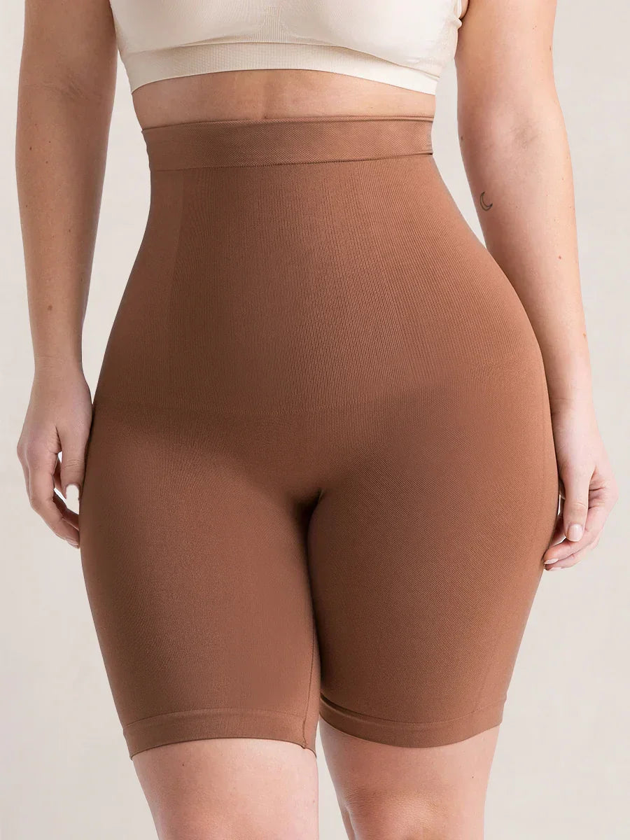 Formivelle high-waisted latte seamless shapewear shorts on model, smooth supportive fit