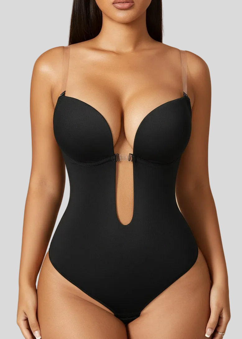 Woman modeling a black backless bodysuit thong with plunge neckline, Formivelle shapewear