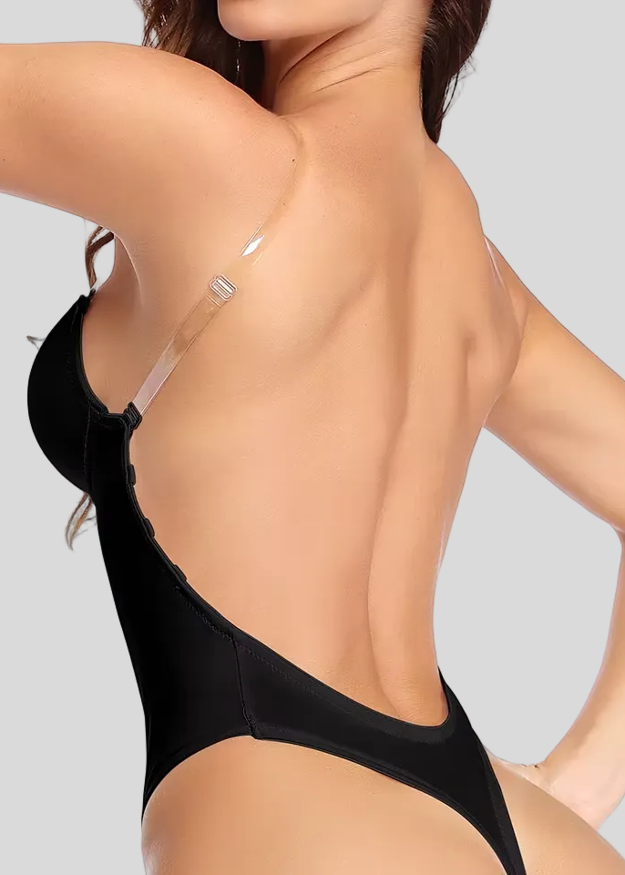 Black swimsuit worn by a model on a white background
