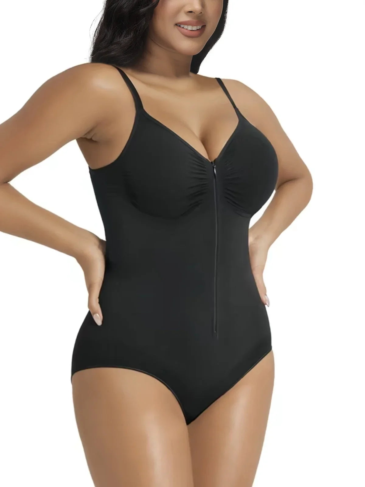 Woman wearing black zip-front sculpting bodysuit by Formivelle on white background